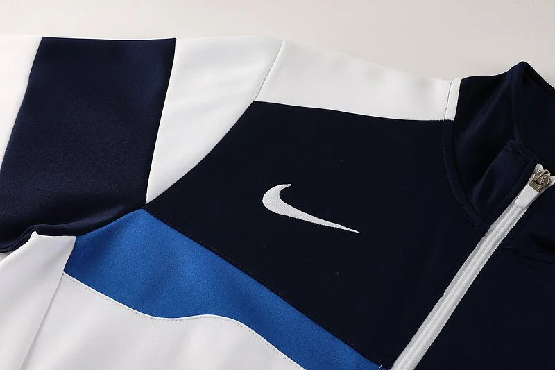 Nike Trainingsanzug Jacke Weiß und Hose Dunkelblau Herren