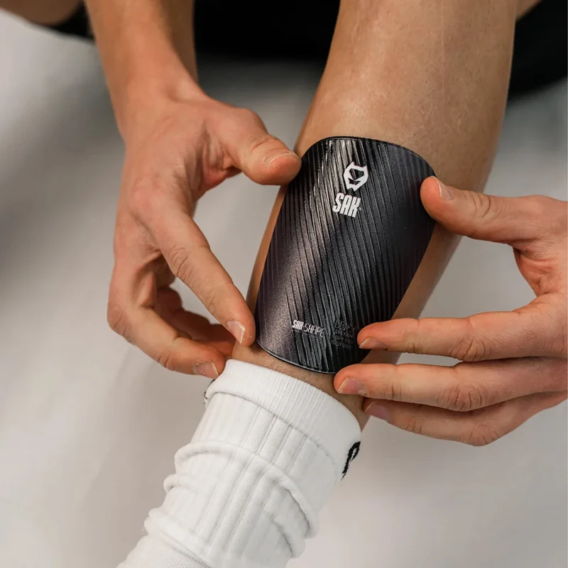 SAK Shape Black Football Shin Guards